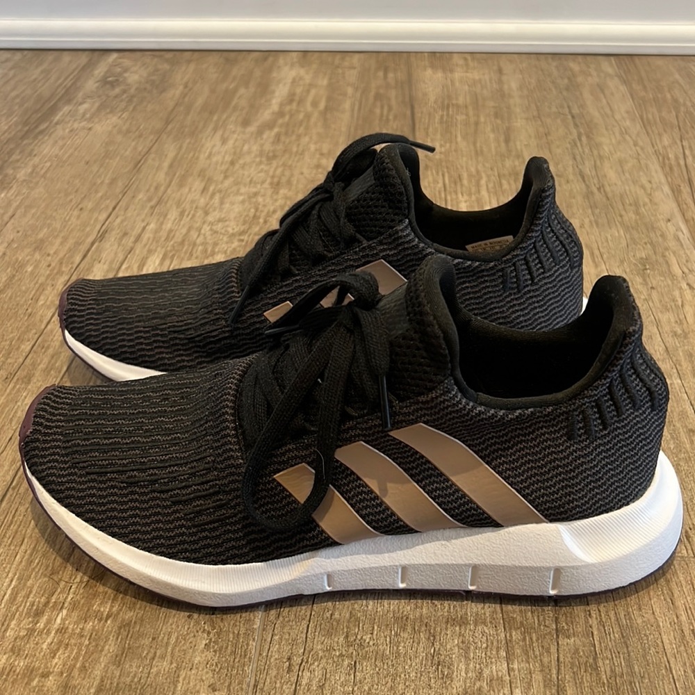 Black and purple adidas sneakers